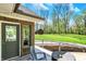Charming backyard patio, ideal for entertaining with a view of the lawn at 6149 W Olive Branch Rd, Greenwood, IN 46143
