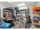 Finished basement featuring shelving, storage, games, and organization at 6149 W Olive Branch Rd, Greenwood, IN 46143