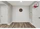 The rec room has a painted brick accent wall with a dart board and mini basketball hoop at 6149 W Olive Branch Rd, Greenwood, IN 46143