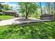 Long driveway leads to this well-maintained property with a detached garage at 6149 W Olive Branch Rd, Greenwood, IN 46143