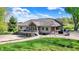 Beautiful home with a large yard, and deck situated on a manicured lawn at 6149 W Olive Branch Rd, Greenwood, IN 46143