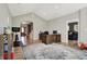 Open home office with hardwood floors, neutral colors and great natural light at 6149 W Olive Branch Rd, Greenwood, IN 46143
