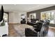 Open living room featuring hardwood floors, neutral colors and lots of seating at 6149 W Olive Branch Rd, Greenwood, IN 46143