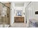 Bathroom featuring tile floors, glass enclosed shower, double doors, and vanity at 6257 Old Barn Ct, Indianapolis, IN 46268