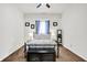 Clean bedroom design featuring neutral tones, plush carpeting, and ceiling fan at 6257 Old Barn Ct, Indianapolis, IN 46268