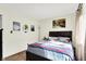 Bedroom with bright walls, carpet, a window, and art on the wall at 6257 Old Barn Ct, Indianapolis, IN 46268