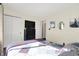 Bedroom with neutral walls, closet and art on the wall at 6257 Old Barn Ct, Indianapolis, IN 46268