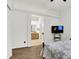 Bright bedroom featuring neutral walls, carpet, and an ensuite bathroom at 6257 Old Barn Ct, Indianapolis, IN 46268