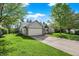 Charming single-Gathering home with a two-car garage and manicured lawn at 6257 Old Barn Ct, Indianapolis, IN 46268