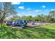 Vibrant playground with slides, swings, and climbing structures for outdoor fun at 6257 Old Barn Ct, Indianapolis, IN 46268