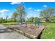Outdoor workout area with exercise equipment for fitness enthusiasts in a park setting at 6257 Old Barn Ct, Indianapolis, IN 46268
