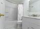Bright bathroom with tub, shower, and marble vanity top at 6638 Sunbury Dr, Indianapolis, IN 46241