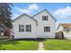 Charming two-story home boasts a well-maintained lawn and inviting curb appeal at 717 S A St, Elwood, IN 46036