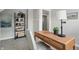 Office area featuring a desk, chair, and stylish ladder bookshelf for storage and decoration at 717 S A St, Elwood, IN 46036
