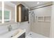 Modern bathroom featuring a stylish vanity, tiled shower, and contemporary fixtures at 7412 Hiner Ln, Indianapolis, IN 46219