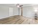 Open living room with a ceiling fan and hardwood floors, offering plenty of space at 7412 Hiner Ln, Indianapolis, IN 46219
