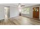 Inviting living room features hardwood floors, natural light, and an open layout at 7412 Hiner Ln, Indianapolis, IN 46219