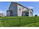 A fenced backyard with a covered patio offers secure outdoor enjoyment and adds value to your property at 745 S Summerhaven Ct, New Palestine, IN 46163