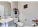 Charming half bathroom featuring a pedestal sink at 745 S Summerhaven Ct, New Palestine, IN 46163