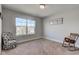 Bedroom with natural lighting, carpet, and chair at 745 S Summerhaven Ct, New Palestine, IN 46163