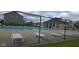 Fenced community pool provides a refreshing amenity for residents with lounge chairs at 745 S Summerhaven Ct, New Palestine, IN 46163