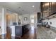 Modern kitchen with granite countertops and stainless steel appliances at 745 S Summerhaven Ct, New Palestine, IN 46163