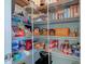 Walk-in pantry with wire shelving provides ample storage for food and kitchen essentials at 745 S Summerhaven Ct, New Palestine, IN 46163