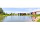 A serene pond view adds natural beauty and tranquility to this neighborhood, offering a peaceful retreat at 745 S Summerhaven Ct, New Palestine, IN 46163