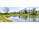 Community pond offers recreation and scenic views, enhancing the lifestyle in this neighborhood at 745 S Summerhaven Ct, New Palestine, IN 46163