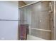 Modern tiled shower with glass enclosure and towel rack at 745 S Summerhaven Ct, New Palestine, IN 46163