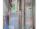 Furnace and hot water heater in a utility room in this home at 745 S Summerhaven Ct, New Palestine, IN 46163
