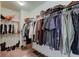 Organized walk-in closet featuring ample storage for clothes, shoes, and accessories at 745 S Summerhaven Ct, New Palestine, IN 46163