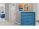 Bedroom entryway with a light blue dresser and views into the bedroom and bathroom at 75 Hovden Dr, Cicero, IN 46034