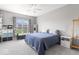 Cozy bedroom with a comfortable bed, large window, and ample natural light at 75 Hovden Dr, Cicero, IN 46034