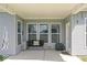 Covered patio offering a cozy seating area with outdoor furniture and pleasant ambiance at 75 Hovden Dr, Cicero, IN 46034