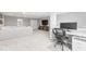 Open-concept living space with neutral colors, modern desk, and media center at 75 Hovden Dr, Cicero, IN 46034