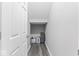 Compact storage room with a basket and luggage with a white door and finished flooring at 75 Hovden Dr, Cicero, IN 46034