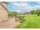 An elevated wooden deck is attached to the back of this brick home at 801 Echo Trl, Martinsville, IN 46151