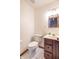 Powder room features a stylish vanity, contemporary toilet, and bright lighting at 801 Echo Trl, Martinsville, IN 46151
