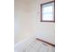 Bathroom features a tub with bright lighting and a window at 801 Echo Trl, Martinsville, IN 46151