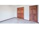 Bedroom with carpet flooring and wood doors at 801 Echo Trl, Martinsville, IN 46151