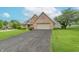 The front of a beautiful brick home with an attached garage at 801 Echo Trl, Martinsville, IN 46151