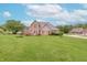 Beautiful home featuring a spacious backyard and large wooden deck at 801 Echo Trl, Martinsville, IN 46151