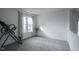 Spacious bedroom featuring neutral carpet and an abundance of natural light at 8875 White Fir Dr, Indianapolis, IN 46256