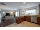 Well-appointed kitchen with granite counters and stainless steel appliances open to the living room at 8875 White Fir Dr, Indianapolis, IN 46256