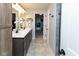 Bathroom featuring a double vanity with a dark wood finish and modern fixtures at 900 Parker Ln, Westfield, IN 46074