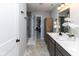 Bright bathroom showcasing a double vanity, a walk-in shower, and modern finishes at 900 Parker Ln, Westfield, IN 46074
