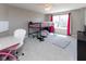 bedroom with a loft bed, a desk, and natural light from the window at 900 Parker Ln, Westfield, IN 46074