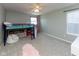 Bedroom with a loft bed, carpet, and natural light from the window at 900 Parker Ln, Westfield, IN 46074