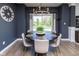 Bright dining area showcasing a table, chandelier, and a view of the backyard at 900 Parker Ln, Westfield, IN 46074